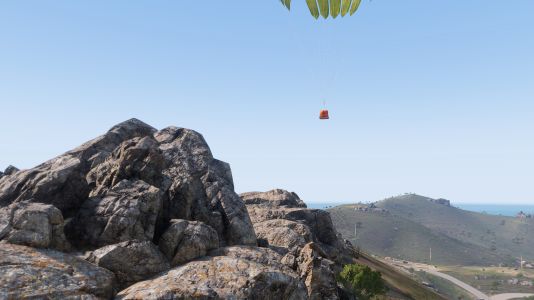 The crate slowly landing on the Altis Island.